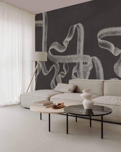 Tapet decorativ cu model de panglici pe un perete într-un living modern