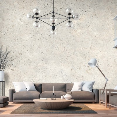 Wallpaper cu design modern, cu aspect de ciment, in nuante de bej, intr-un living cu canapea si fotolii.