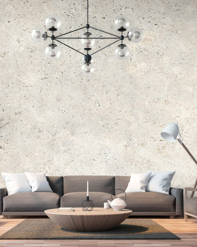 Wallpaper cu design modern, cu aspect de ciment, in nuante de bej, intr-un living cu canapea si fotolii.