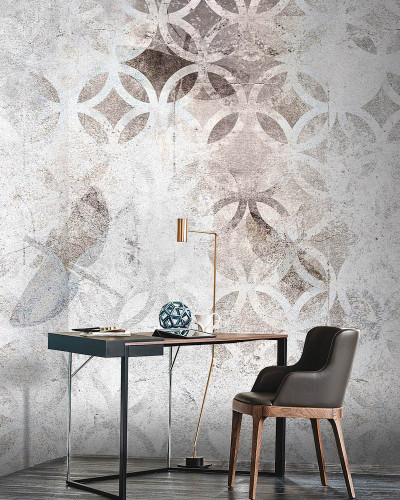 Tapet contemporan cu model geometric minimalist, pe un fundal de beton cu textură brută.