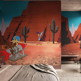 Fototapet Looney Tunes 205 într-un dormitor modern, prezentând pe Wile E. Coyote pe o rachetă și pe Road Runner în deșertul cu cactuși.
