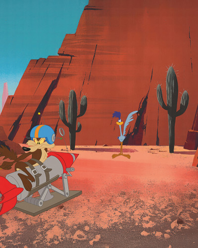 Fototapet Looney Tunes 205 într-un dormitor modern, prezentând pe Wile E. Coyote pe o rachetă și pe Road Runner în deșertul cu cactuși.