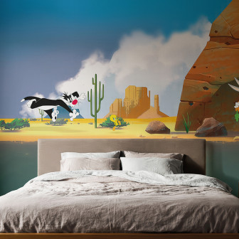 Fototapet Looney Tunes 206 cu Bugs Bunny, Sylvester și Tweety într-un dormitor modern, pe un perete cu peisaj de deșert animat.