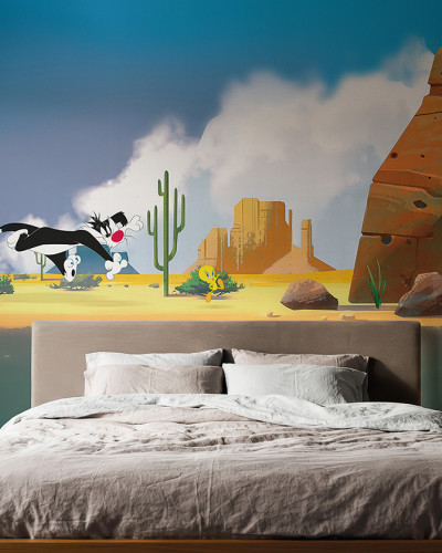 Fototapet Looney Tunes 206 cu Bugs Bunny, Sylvester și Tweety într-un dormitor modern, pe un perete cu peisaj de deșert animat.