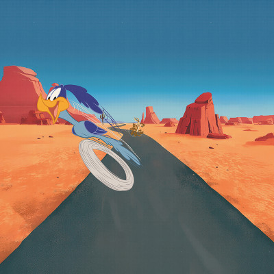 Fototapet cu Road Runner în viteză și Wile E. Coyote în deșert, într-un decor de bucătărie modernă cu blat din lemn.