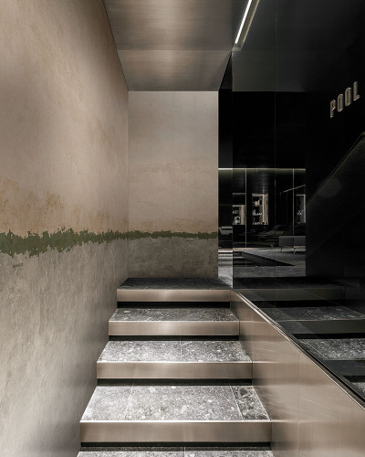 Tapet Cement Horizon (verde) cu aspect modern, cu un design minimalist si o nuanta de verde subtil.