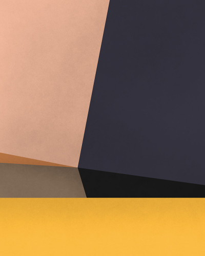 Tapet geometric cu forme simple și culori vibrante: galben, maro, gri și negru.