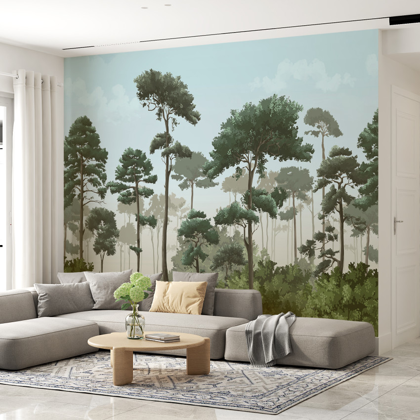 Tapet cu design de pădure de pini, cu nuanțe de verde și albastru, pe un perete din living, lângă o canapea gri.