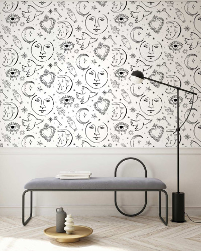 Tapet cu design modern, cu fețe de lună, stele, inimi și ochi, în negru pe alb.