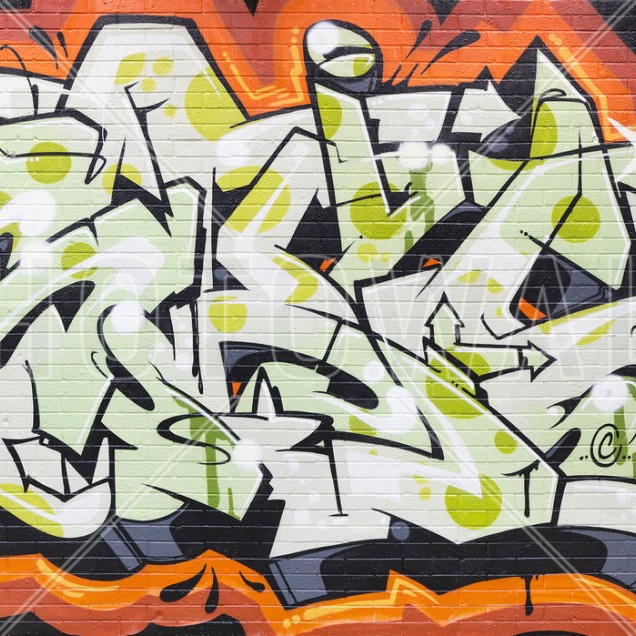 Tapet perete cu design graffiti pe un perete de caramida, in nuante de verde, negru si portocaliu.