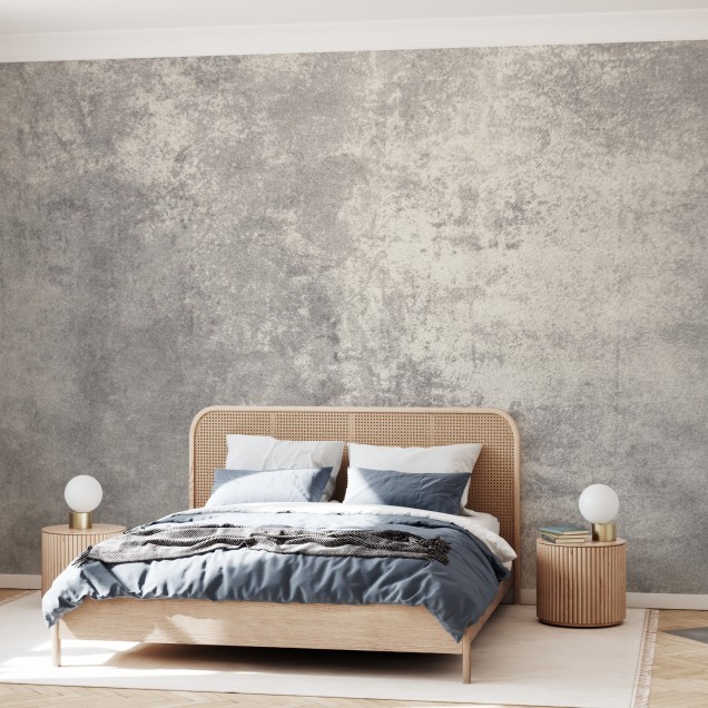 Stone Patina  wallpaper, featuring a textured stone design.  A bedroom interior with  wallpaper on the wall, showcasing the subtle nuances of the pattern.