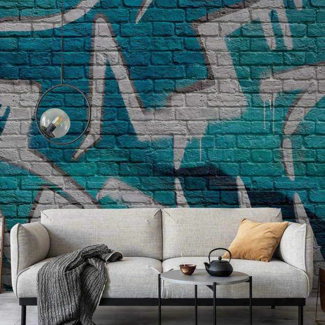 Fototapet cu graffiti turquoise pe zid de cărămidă