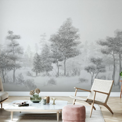 Tapet Bohemian Forest, BW, cu un design minimalist in tonuri de gri, cu o pădure liniștită, perfect pentru a crea o atmosferă relaxantă și sofisticată.  Se vede livingul cu canapea, scaun, masă de cafea și alte decorațiuni.