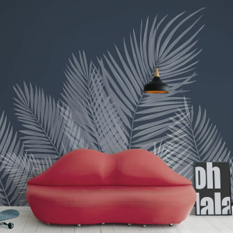 Fototapet cu frunze de palmier albastre într-un interior modern