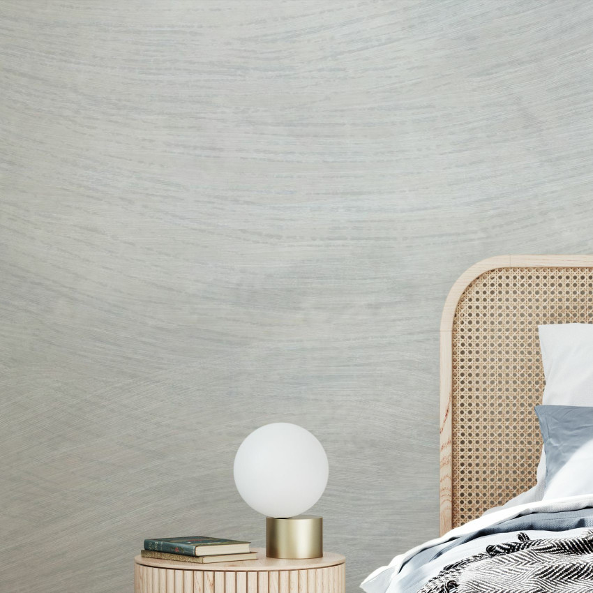 Wallpaper cu un design abstract în nuanțe de albastru și verde, cu linii ondulate care amintesc de valuri. Un decor perfect pentru a crea o atmosferă zen în living.