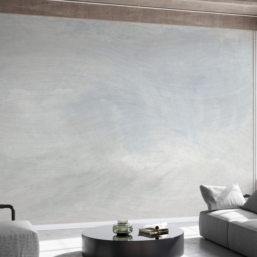 Wallpaper cu un design abstract în nuanțe de albastru și verde, cu linii ondulate care amintesc de valuri. Un decor perfect pentru a crea o atmosferă zen în living.