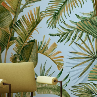 Fototapet cu design tropical - frunze verzi pe fundal albastru