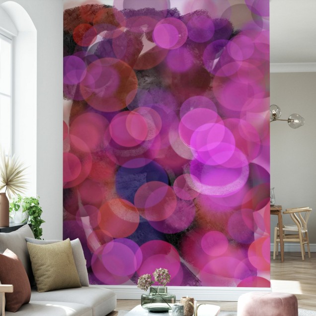 Tapet cu design abstract cu cercuri suprapuse în nuanțe de violet, roz și roșu.