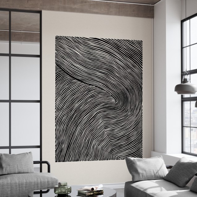 Tapet modern cu dungi Stripes Linocut, Black III, în nuanțe de negru și alb, pe un perete în living.