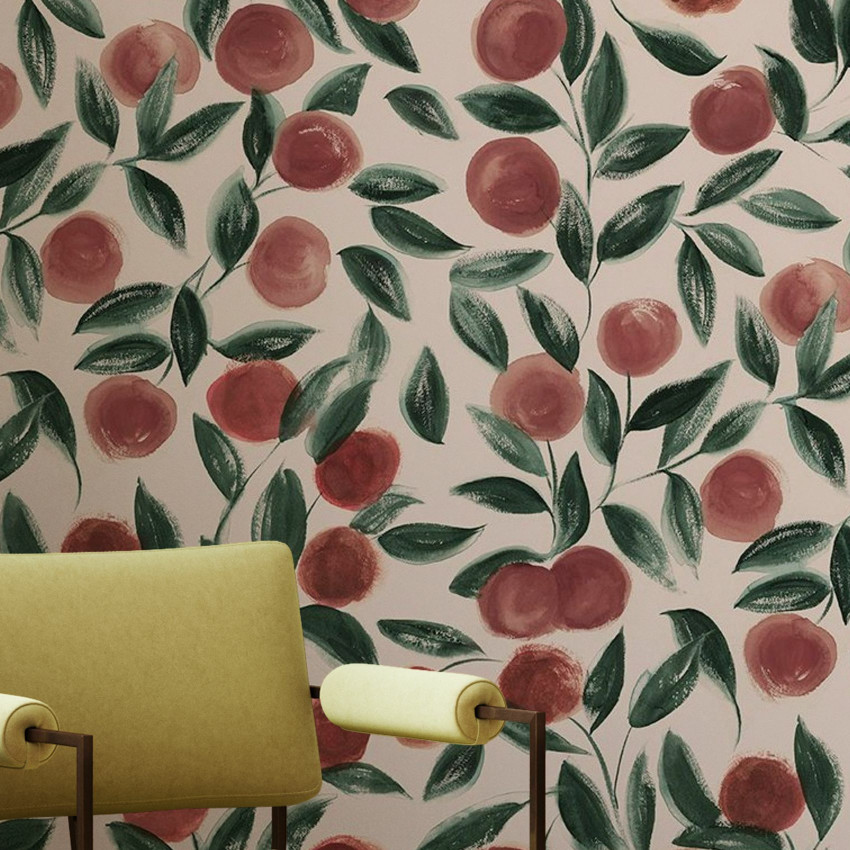 Tapet cu design artistic, cu portocale portocalii și frunze verzi.