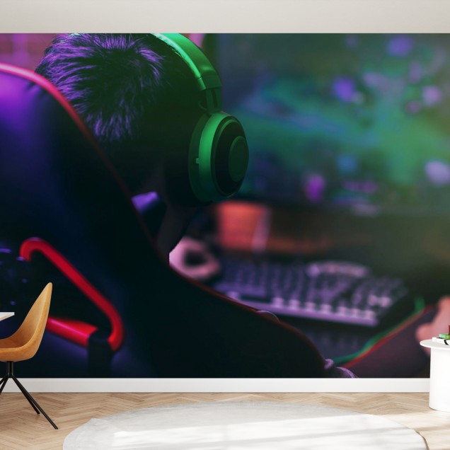 Tapetul Gamer Playing Games, cu un design modern, care aduce o notă de personalitate și culoare în cameră