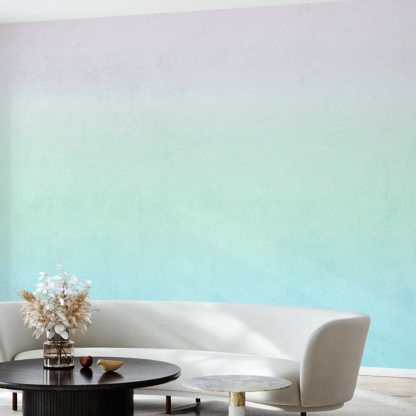 Tapet Polar Sunset cu degradeuri de culori pastelate, albastru si violet, aplicat pe un perete intr-un living modern