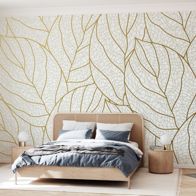 Tapet Gradient Gold Leaves cu frunze aurii pe un fundal alb, in interiorul unei camere moderne