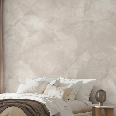Fototapet bej cu aspect mineral într-un dormitor