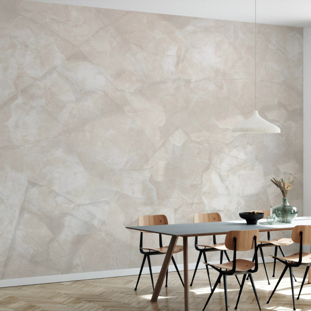 Fototapet bej cu aspect mineral într-un dormitor