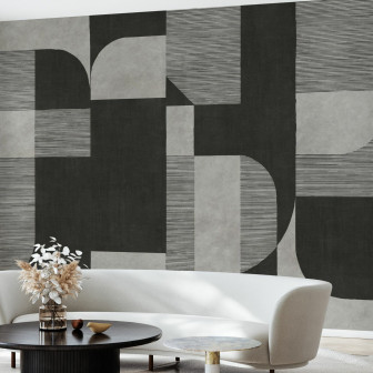 Fototapet abstract cu design geometric în nuanțe de gri și negru într-un living modern.