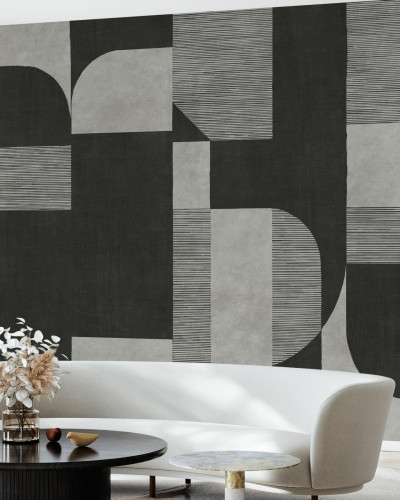 Fototapet abstract cu design geometric în nuanțe de gri și negru într-un living modern.