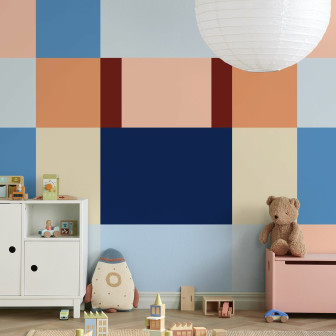 Fototapet cu design geometric în nuanțe de albastru și piersică în camera unui copil.