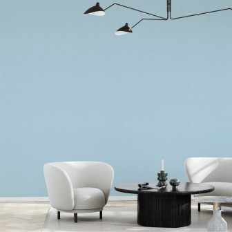 Fototapet uniform albastru-gheață într-un living modern