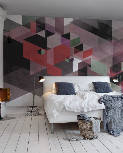 Tapet 3D cu model geometric, cu un accent pe nuantele rosii intense, decorand un dormitor.
