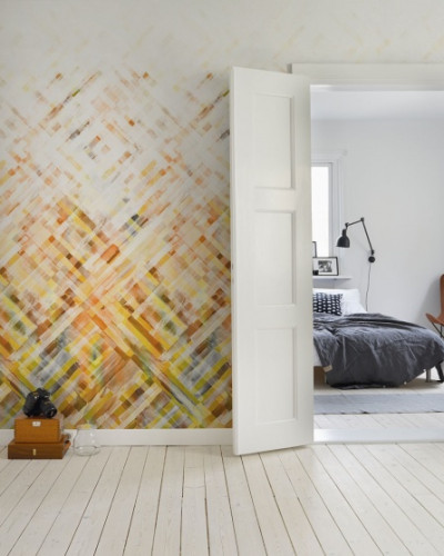 Tapet geometric Dream Weaver, cu design modern și culori calde de galben și alb.