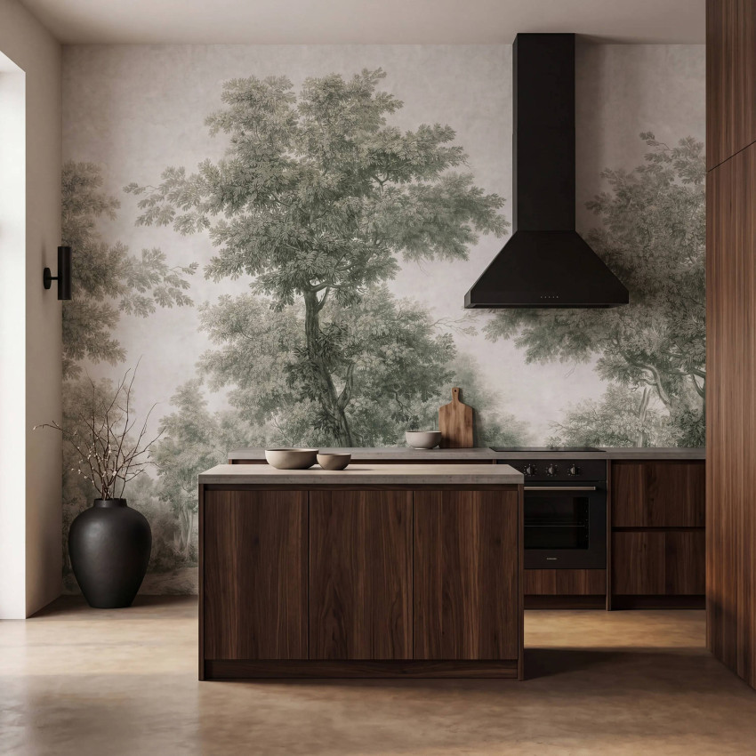 Tapet cu copaci în nuanțe de verde deschis, integrat într-o bucătărie modernă cu mobilier din lemn închis la culoare.