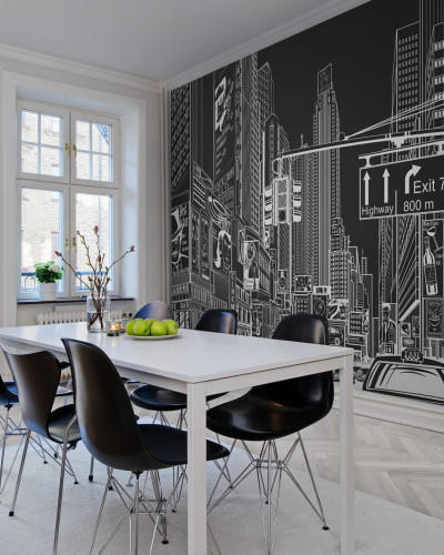 Tapet 3D Cartoon City  Negru - Imagine cu un tapet 3D pe un perete din living. Tapetul 3D ilustrează o imagine a unui oraș cu clădiri înalte și o stradă animată.