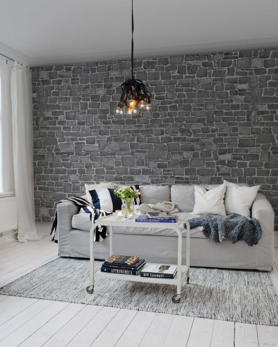 Tapet modern Stonewall Black, cu un design din piatră gri, ideal pentru a crea o atmosferă contemporană și rafinată.