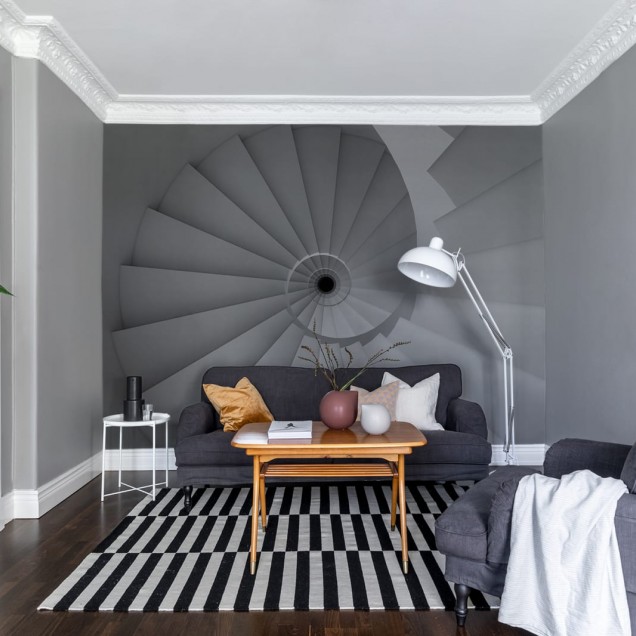 Tapet cu design geometric, cu o scara in spirala, in nuante de gri,  in interiorul unui spatiu modern.