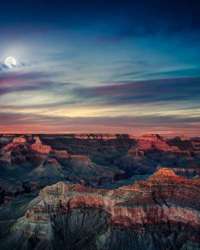 Tapet Grand Canyon cu o priveliste spectaculoasa a canionului, in culori calde de apus.