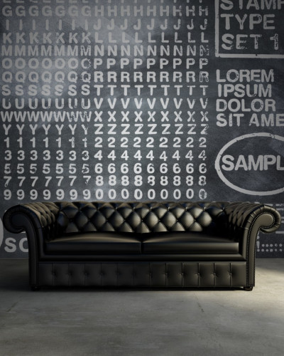 Tapet Rubber Stamp, negru, cu design grafic minimalist, cu ștampile de litere, cifre și simboluri din font clasic, imprimate pe un fundal gri.