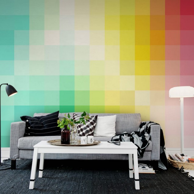 Fototapet cu design geometric si culori vibrante, cu un aranjament de pătrate în nuanțe de verde, galben și roz, într-un birou cu un desktop alb