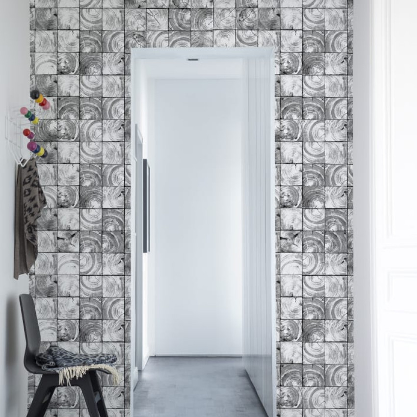 Tapet Age Rings, Green, cu model geometric in nuante de verde deschis, aplicat intr-un living modern.