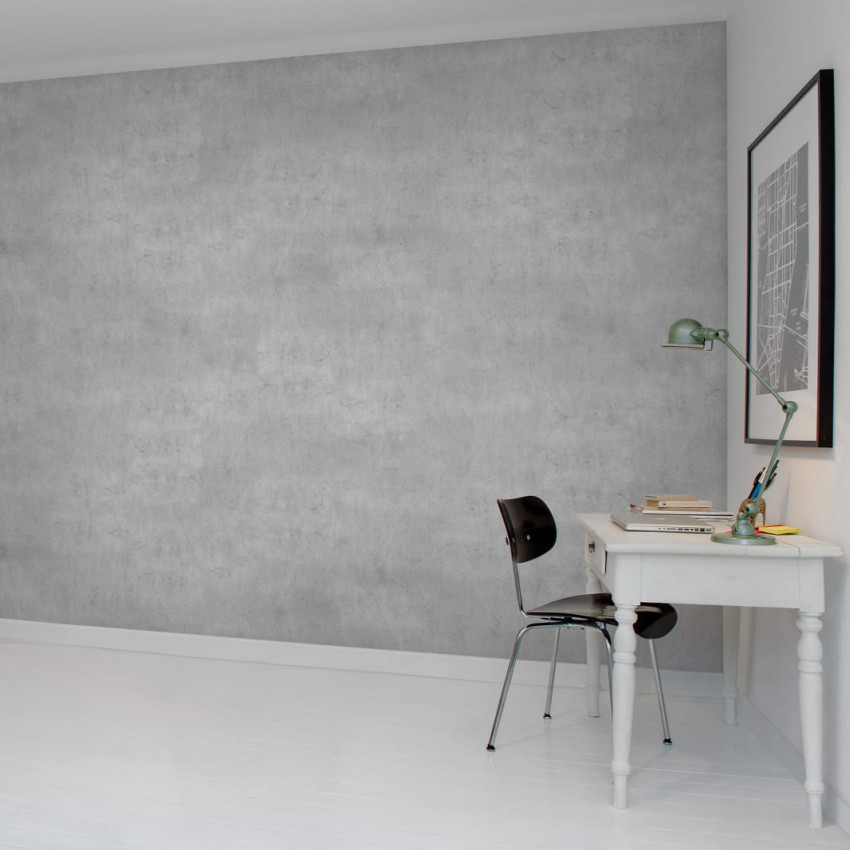Tapet Solid Blush - O nuanță delicată de roz, perfectă pentru living, dormitor sau baie. Imaginea prezintă o cameră cu canapea, covor, plante și alte decorațiuni, toate armonizate cu culoarea tapetului.
