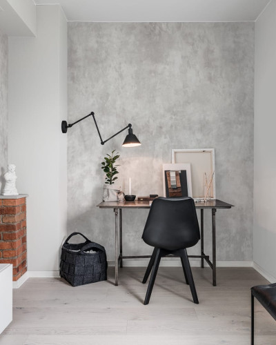 Imagine cu un wallpaper gri minimalist, cu aspect de beton.