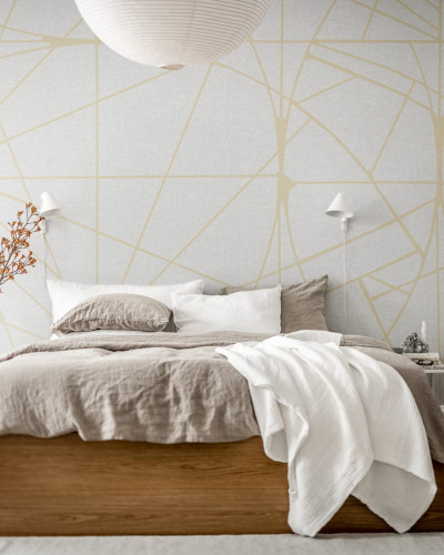 Tapet geometric auriu cu linii fine, decorând un dormitor modern.