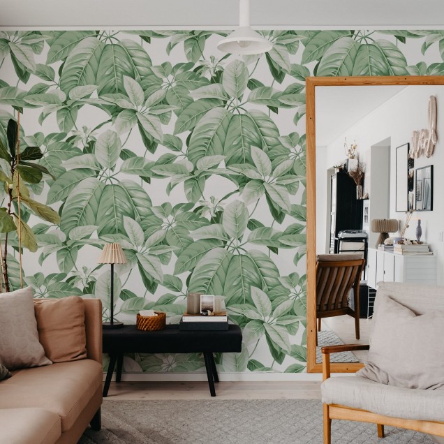 Tapet cu frunze mari, de un verde vibrant, pe un fundal alb. Design elegant și versatil, perfect pentru a adăuga o notă de culoare și prospețime oricărei camere.