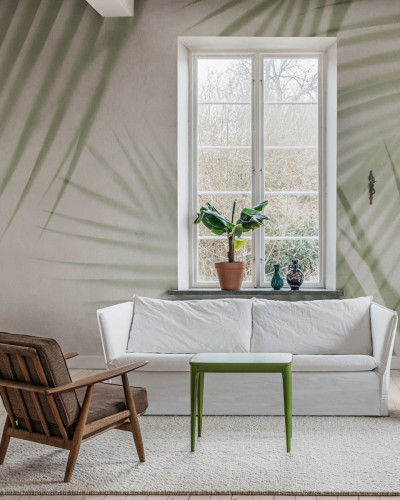 Fototapet cu design frunze de palmier într-un living elegant