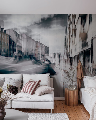 Tapet City Pulse cu un design modern, abstract, care ilustrează clădirile din oraș în mișcare.