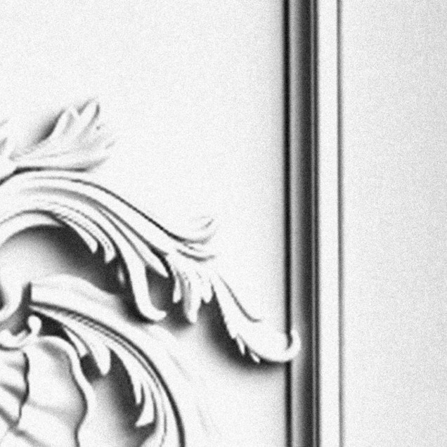Tapet cu design clasic elegant, cu elemente decorative elaborate, perfect pentru a crea un decor sofisticat în orice cameră.